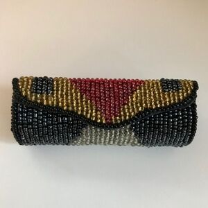 Lipstick case beaded in abstract design New never used